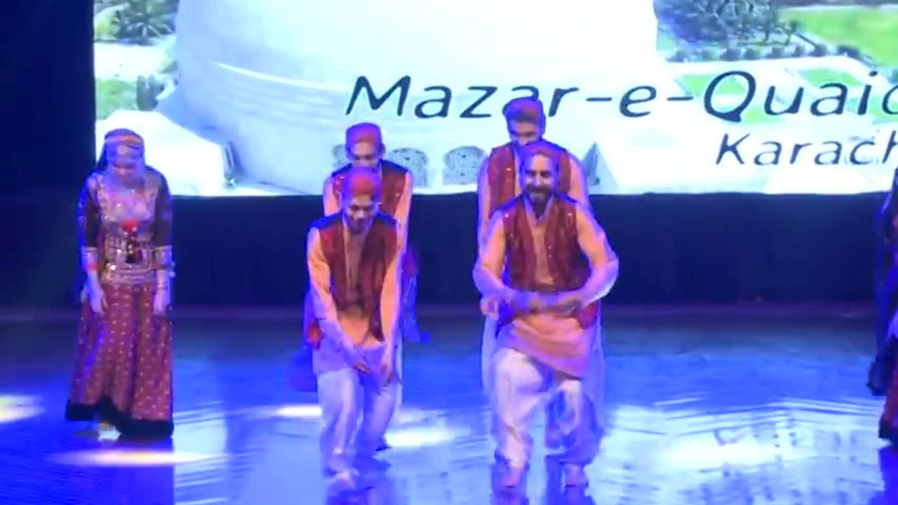 Group folk dance performance in Punjabi dress